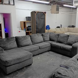 Dark gray sectional couch dark