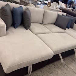Sectional With Pull Out Sleeper & storage 