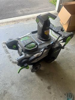 EGO SNT2112 21” Peak Power snow blower kit, including two 5.0Ah 56V batteries and the dual-port charger.