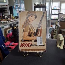 "NEW " World War II Tin Sign-A Woman In A Military Style Uniform Holding An MI Garand Rifle "Who Wants To Know? Silence Means Security" 12x8