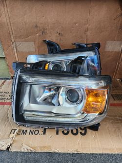 2015,2023 gmc canyon pair of headlights