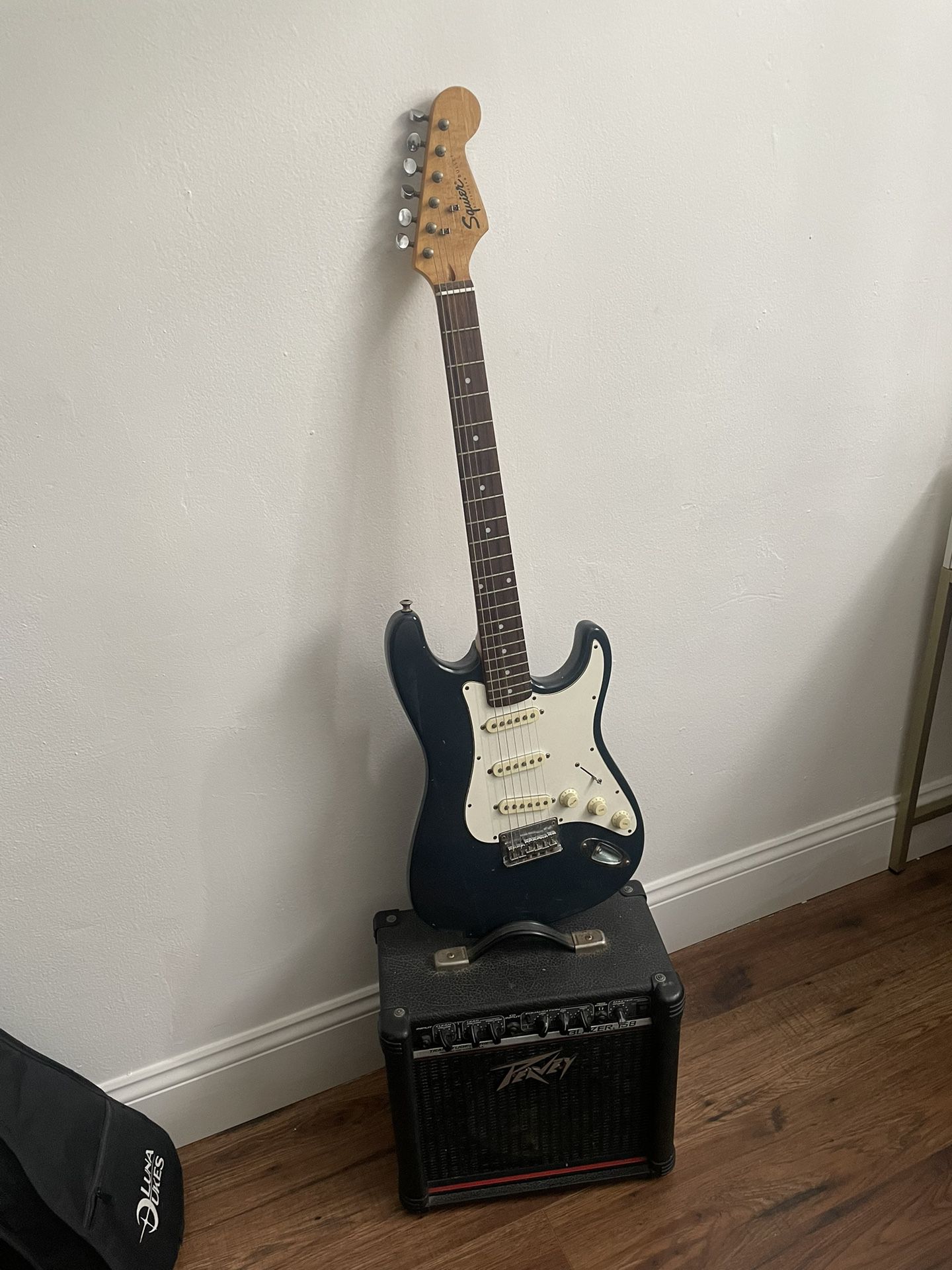 Squier Electric Guitar With Amp
