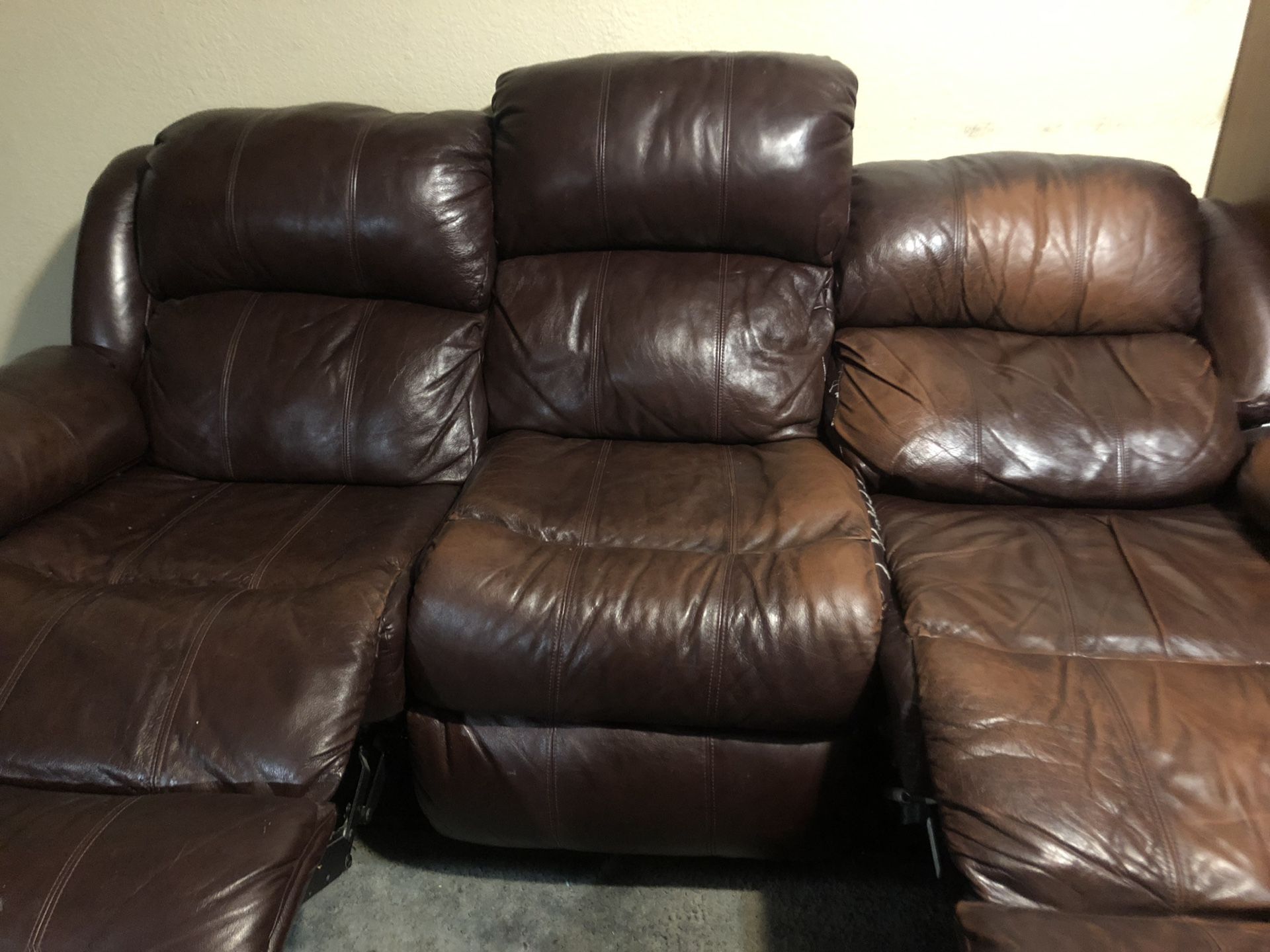 Leather couch with dual recliners