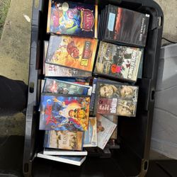 Two Costco Size Totes Full Of DVDs 