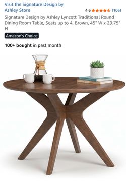 Walnut mid century modern round dining room table