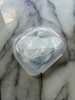 Blue Beaded Bracelet in Clear Case