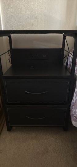Twin bed with side nightstand