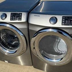 Graphite steel front load  washer and  front load dryer electric  high efficiency working perfectly 
