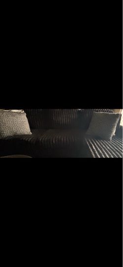 Dark Fabric Sofa with Throw Pillows