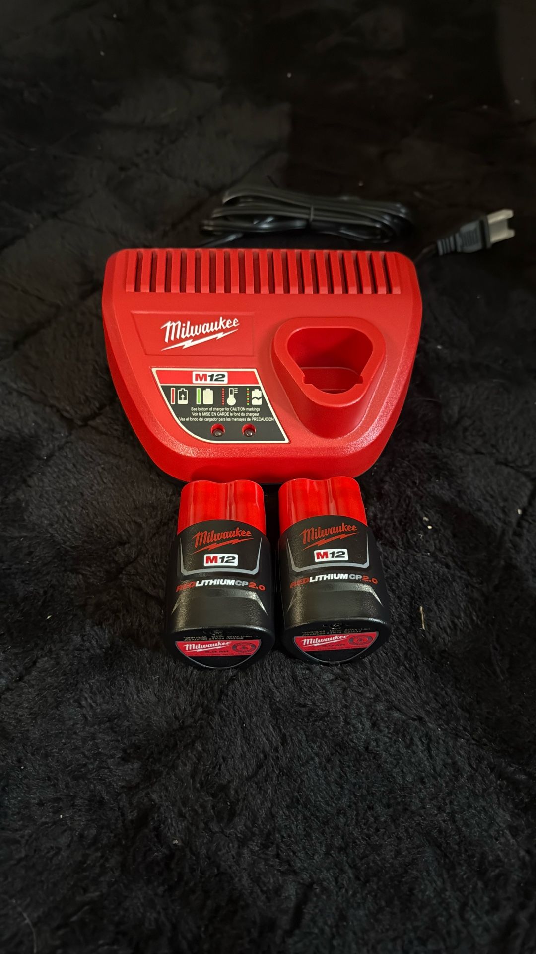 Brand New Milwaukee M12 2.0 Batteries And Charger.