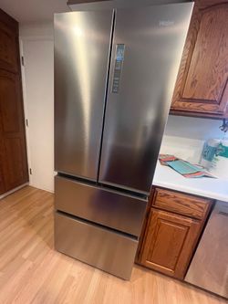 Haier fridge, French doors, middle drawer and freezer bottom. A couple months old, hardly used. Excellent condition!