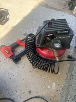 portable Husky 100 PSI Max air pneumatic brad nailer