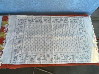 vintage Indian block-printed cotton dhurrie or a Turkish flat-weave Oushak rug