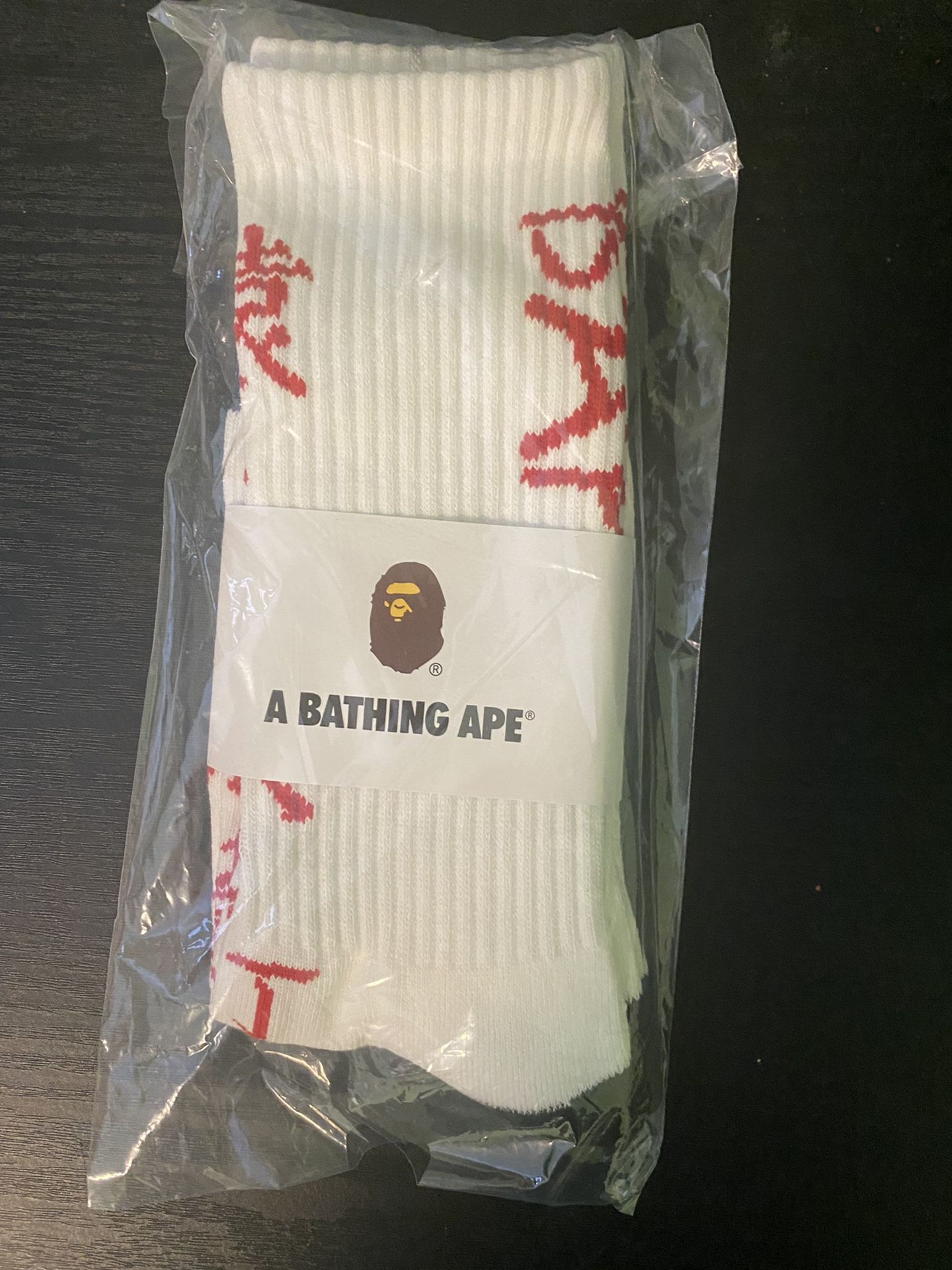 BAPE white Kanji logo. 