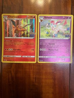Pokemon GO Charizard Holo 10/78 & Sylveon Reverse Holo 35/78 Lot of 2! NM/M 💫