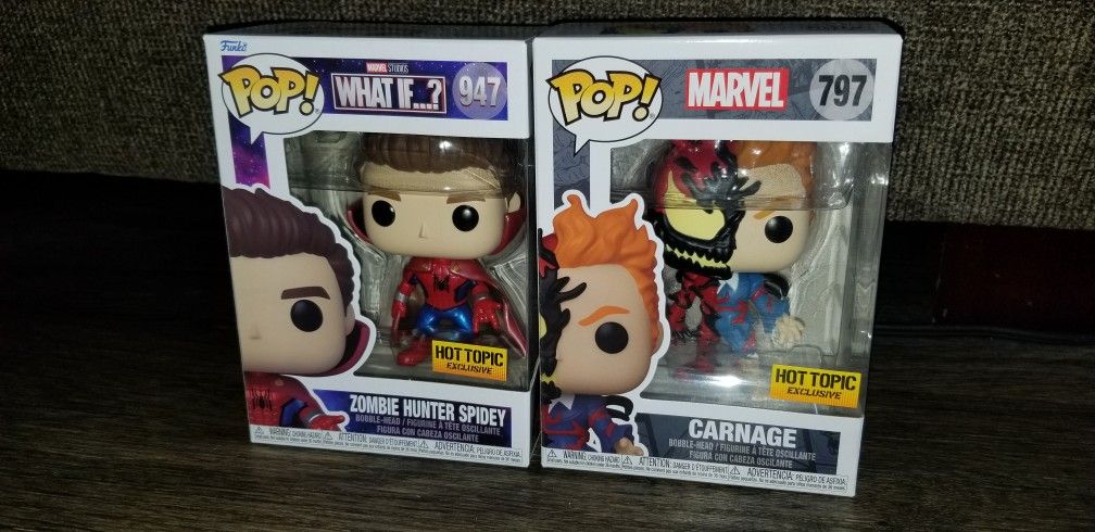 Carnage and Zombie Hunter Spidey Funko pop Hot topic Exclusive 