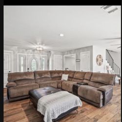 Sectional With Recliners And Storage Ottoman