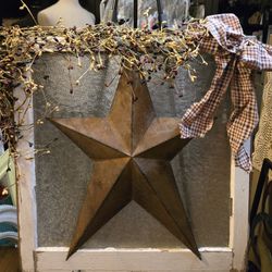 Farmhouse glazed window with metal star dried flowers
