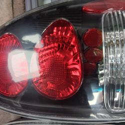 Tail Lights For A 1997 Plymouth Voyager Minivan 