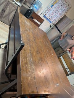Solid wood table with metal legs