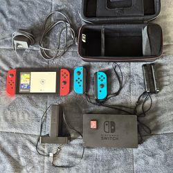 Nintendo Switch Bundle + Extra Joy Cons + Charging Station + Mario Odyssey + Case
