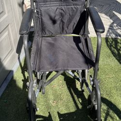 Transport wheelchair