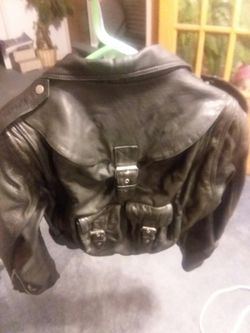 Leather jacket size small with full size backpack pocket in the back