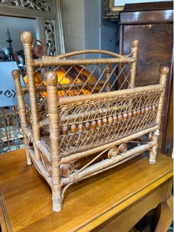 Vintage wicker paper rack