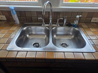 Sink and faucet and garbage disposal