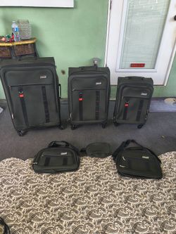 6 piece green Coleman luggage set