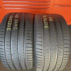 21” tires semi new pirelli 315/30/21 with free installation $300 both