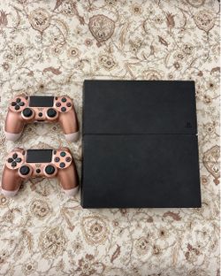 Sony PlayStation 4 Console with Two Controllers