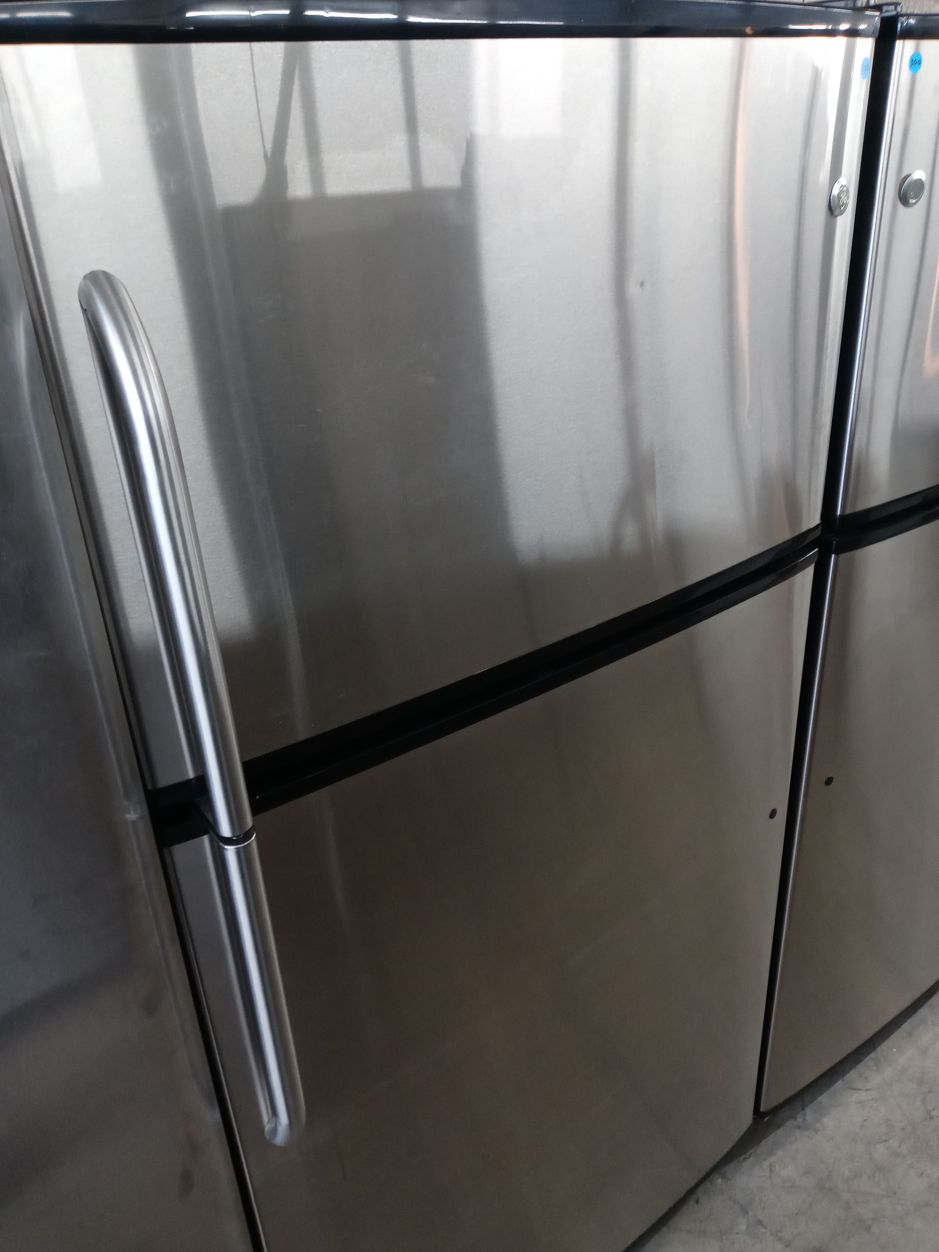 GE stainless steel top freezer refrigerator - Free delivery