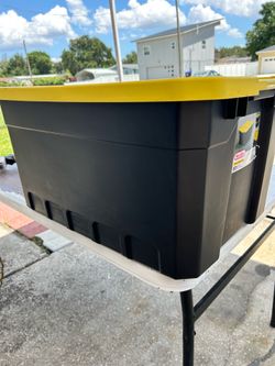 Black and yellow large storage container