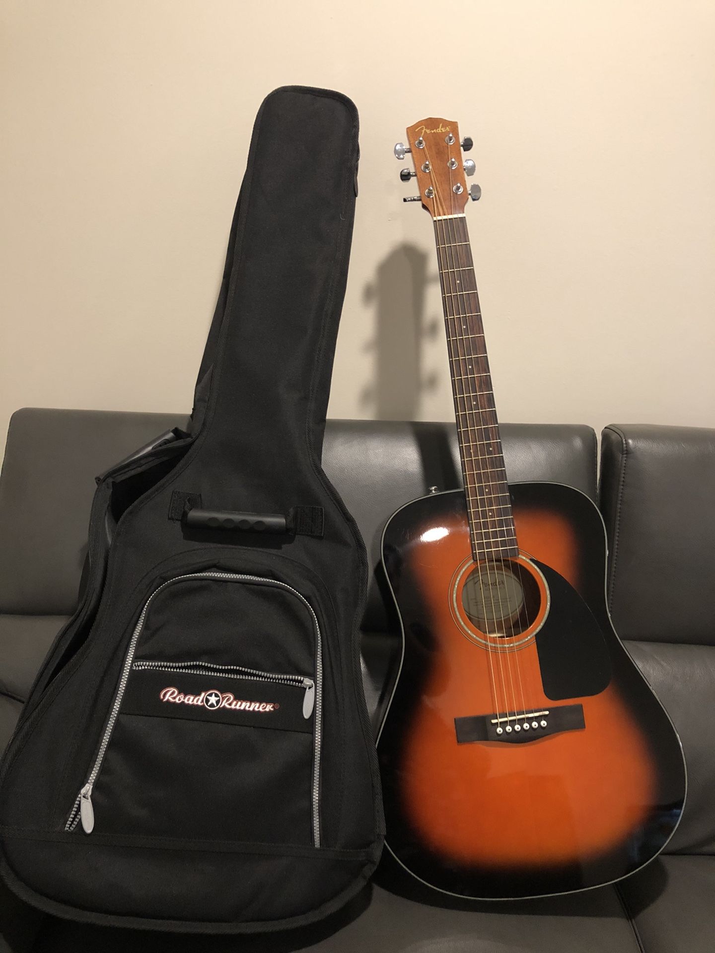 Fender guitar with road runner carrying case
