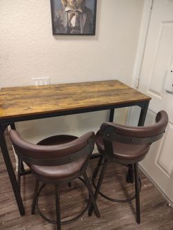 Bar top  tablewith 2 swivel chairs