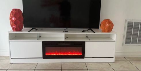 Modern white TV stand with fireplace