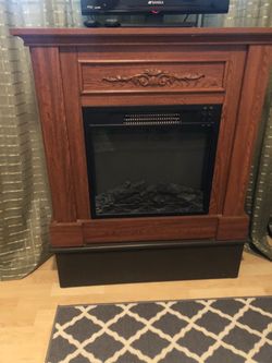 Electric fireplace with heater