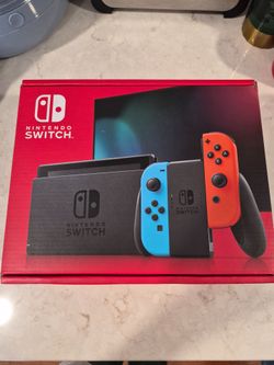 Nintendo Switch - Neon Blue + Neon Red
