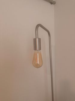 Article floor length lamp