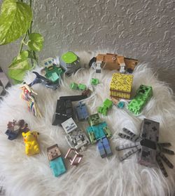 Assorted lot of pixelated Minecraft action figures