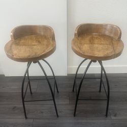 Set of swivel wood bar stools