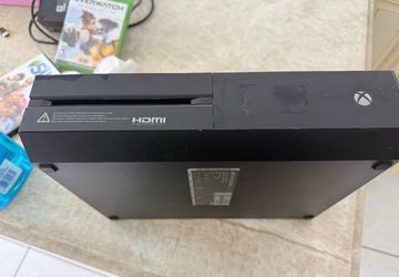X Box Plus 16 Games as is. (Missing cable)