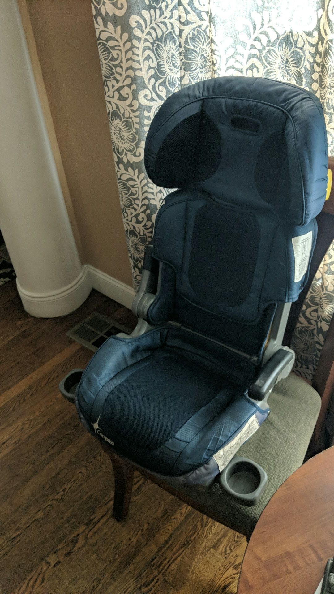Booster seat with high back adjustable head rest