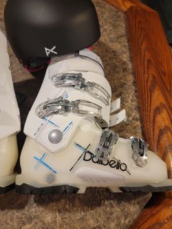 Woman's skin boots with helmet and bag