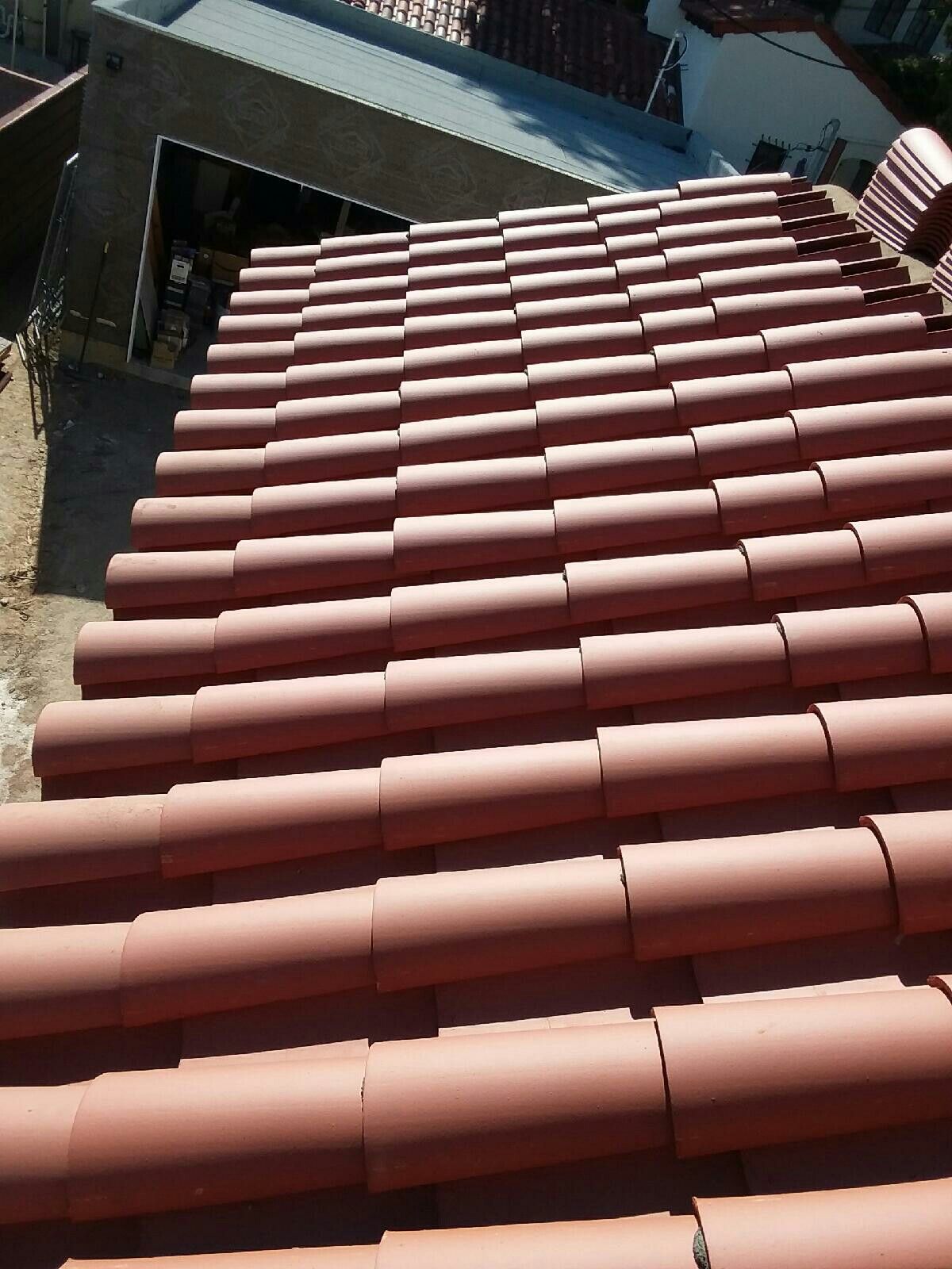 New roof. Tile , torch, and shingles