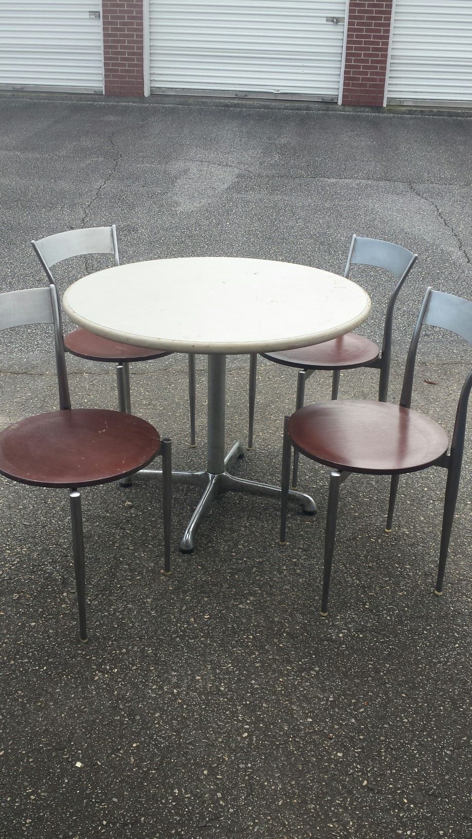 Table & 4 stainless steel chairs with wood bottom