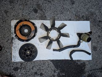 1986 to 1992 Toyota supra 7mge manual stock clutch kit, stock fan and power steering fluid reservoir
