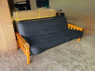 Full size futon with mattress.