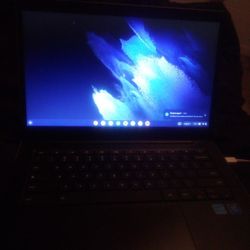 Silver Chrome Book Laptop And PlayStation 4 